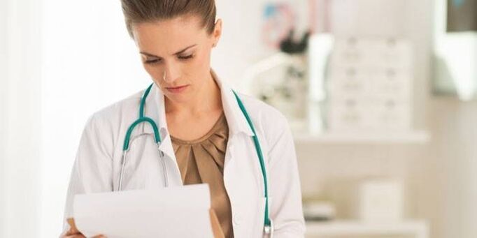 the doctor examines tests for the diagnosis of papillomavirus